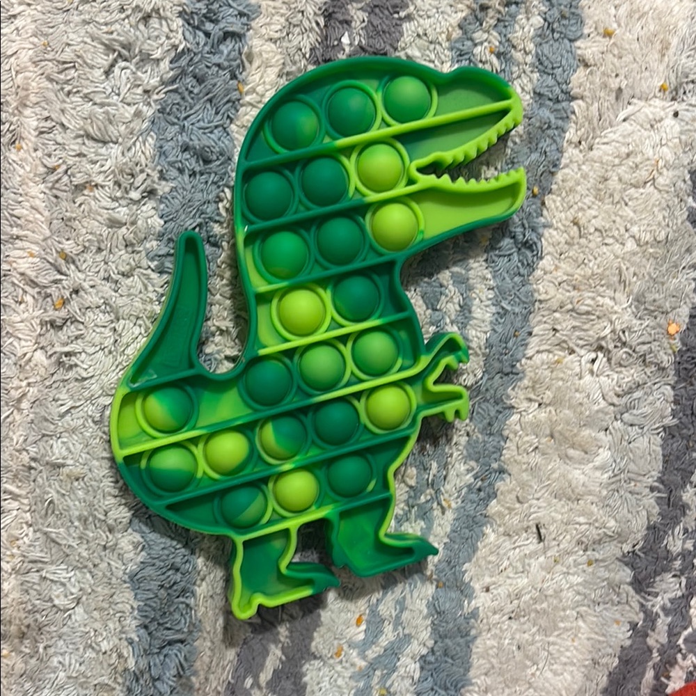 Green Dinosaur Reptile Pop Toy